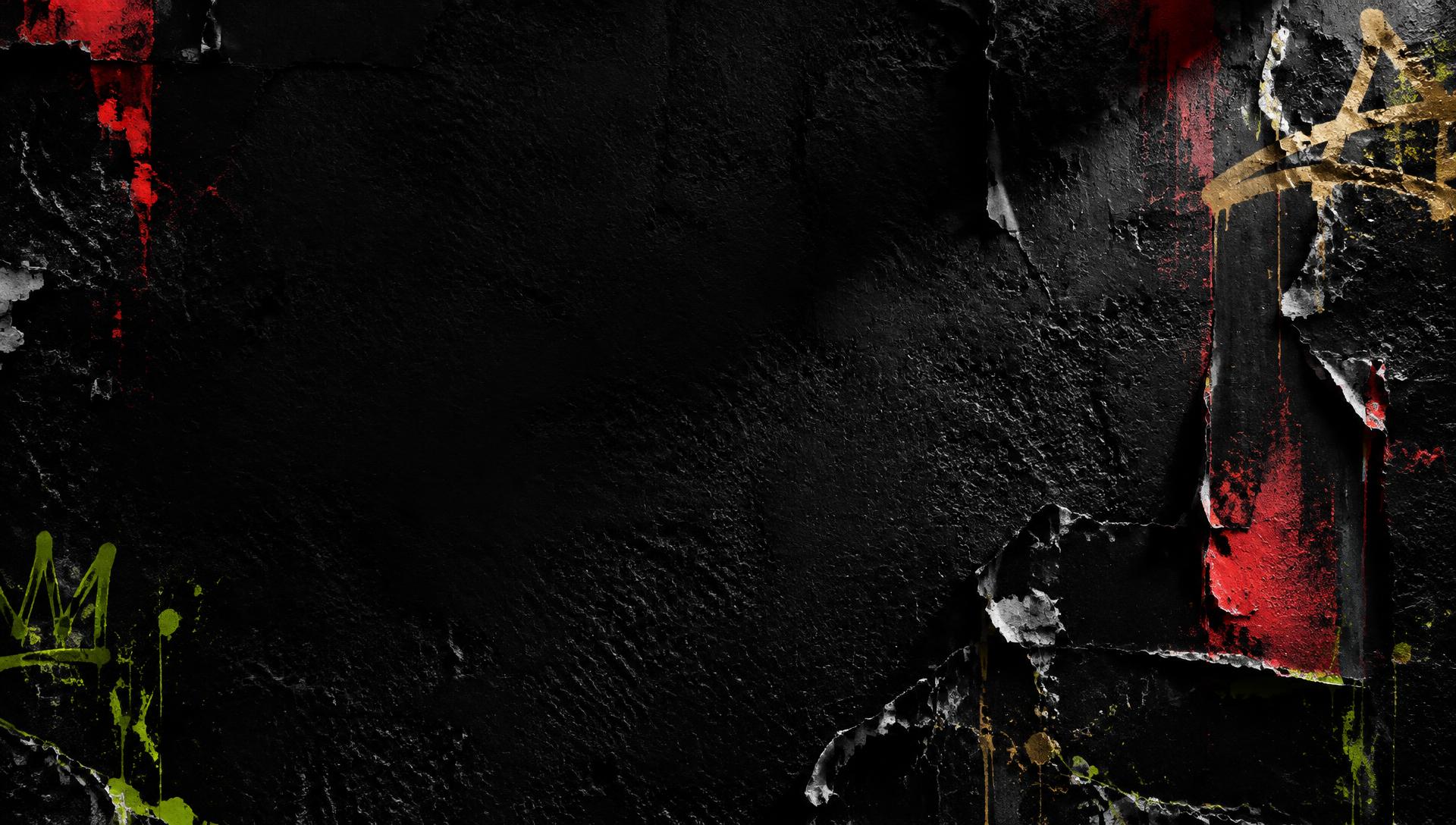 Textured black wall with red and gold street-art details